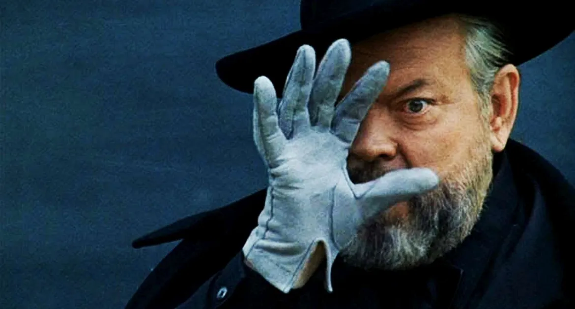 Hombre con sombrero y guantes